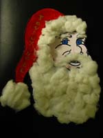 Remplir la barbe du Père-Noël de coton